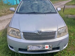 2004 Toyota Corolla Runx IX (E120, E130), серебристый, 649000 рублей, вид 2