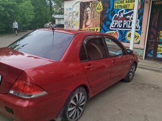 2006 Mitsubishi Lancer IX Рестайлинг, красный, 370000 рублей, вид 4