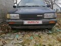 1987 Mazda 323 III (BF), синий, 90000 рублей - вид 1
