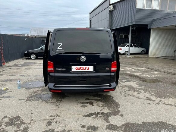 2012 Volkswagen Multivan T5 Рестайлинг, чёрный, 2750000 рублей - вид 4