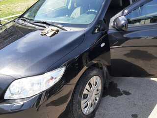 2008 Toyota Corolla X (E140, E150), чёрный, 1150000 рублей, вид 2