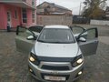 2013 Chevrolet Aveo II, серебристый - вид 3