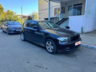 2010 BMW 1 серии 116i I (E81/E82/E87/E88) Рестайлинг, чёрный, 795000 рублей, вид 1