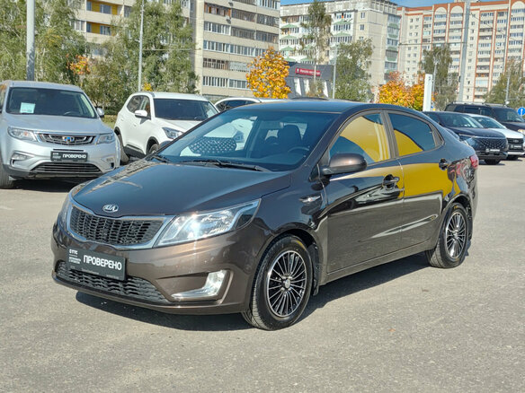 2014 Kia Rio 6-speed III, коричневый, 825000 рублей