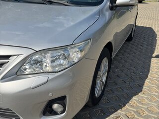 2010 Toyota Corolla X (E140, E150) Рестайлинг, серебристый, 1170000 рублей, вид 2