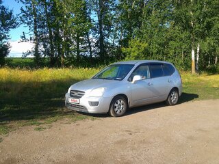 2010 Kia Carens II (UN), серебристый, 600000 рублей, вид 2