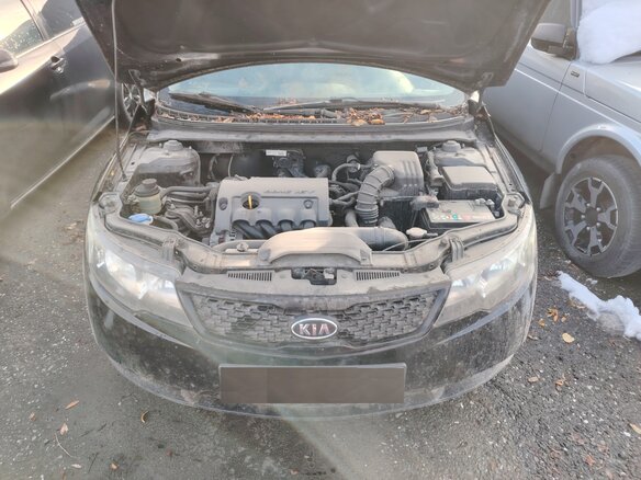 2011 Kia Cerato 5-speed II, чёрный, 556000 рублей - вид 2