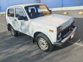 2012 Lada (ВАЗ) 2121 (4x4) I Рестайлинг, белый, 415000 рублей - вид 1
