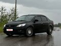 2011 Ford Focus II Рестайлинг, чёрный, 790000 рублей - вид 2
