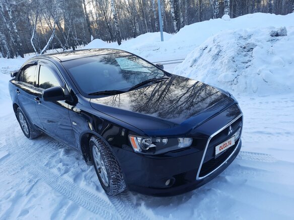 2012 Mitsubishi Lancer X Рестайлинг, чёрный, 1400000 рублей - вид 1