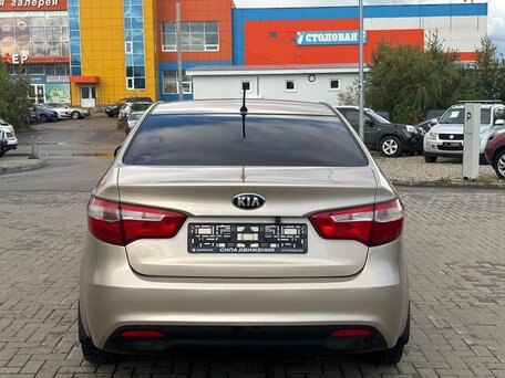 2014 Kia Rio 6-speed III, бежевый, 950000 рублей, вид 5