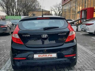 2014 Hyundai Solaris I Рестайлинг, чёрный, 900000 рублей, вид 1