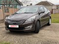 2014 Hyundai Solaris I Рестайлинг, коричневый, 1150000 рублей - вид 1