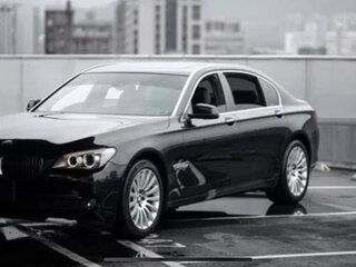 2010 BMW 7 серии 750i xDrive V (F01/F02/F04), чёрный, 1050000 рублей, вид 1