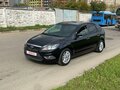 2010 Ford Focus II Рестайлинг, чёрный - вид 2