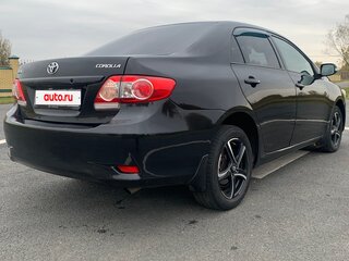2010 Toyota Corolla X (E140, E150) Рестайлинг, чёрный, 710000 рублей, вид 4