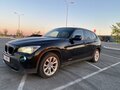 2011 BMW X1 20d I (E84), чёрный - вид 2