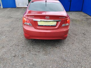 2011 Hyundai Solaris I, красный, 850000 рублей, вид 4