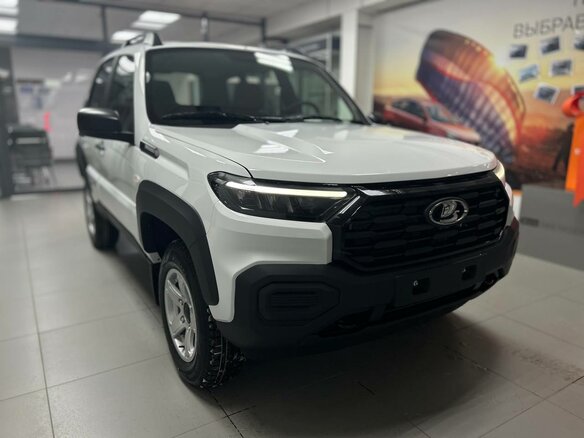 2026 Lada (ВАЗ) Niva Travel I Рестайлинг, белый, 1603000 рублей - вид 1
