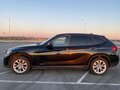 2011 BMW X1 20d I (E84), чёрный - вид 1