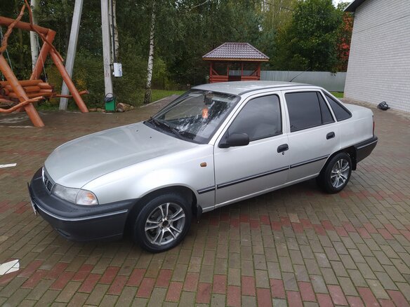 2008 Daewoo Nexia I, серебристый - вид 2