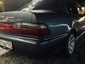 1992 Toyota Corolla VII (E100), синий - вид 6