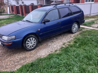 1996 Toyota Corolla VII (E100), синий, 333000 рублей, вид 4