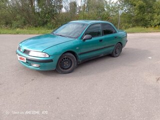2002 Mitsubishi Carisma I Рестайлинг, серебристый, 220000 рублей, вид 1