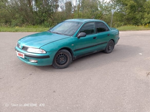 2002 Mitsubishi Carisma I Рестайлинг, серебристый, 220000 рублей