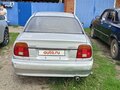 1995 Suzuki Cultus Crescent III, серый - вид 2
