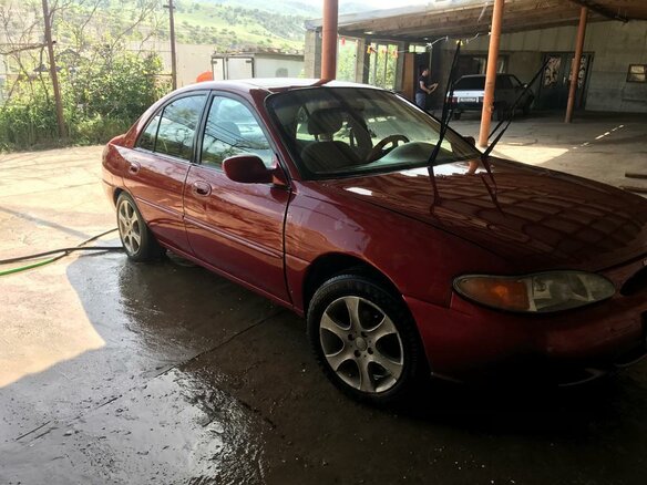 1996 Ford Escort (North America) III, красный