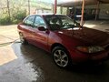 1996 Ford Escort (North America) III, красный