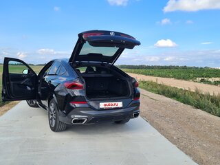 2019 BMW X6 M50i III (G06), синий, 6500000 рублей, вид 4