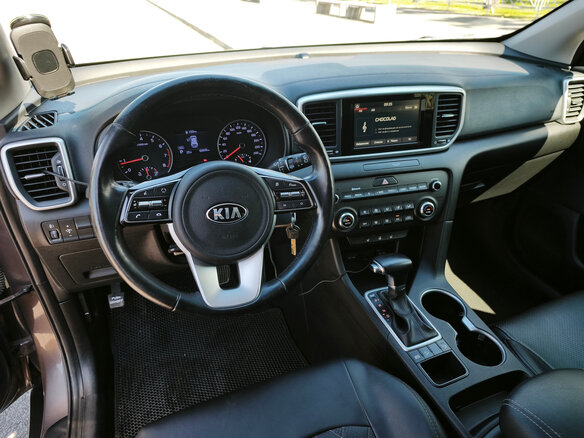 2020 Kia Sportage IV Рестайлинг, коричневый - вид 14