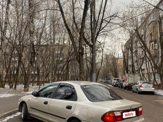 1997 Mazda 323 V (BA), бежевый, 250000 рублей, вид 2