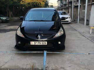 2003 Mitsubishi Grandis I, чёрный, 720000 рублей, вид 1