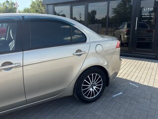 2008 Mitsubishi Lancer X, золотистый, 620000 рублей, вид 4