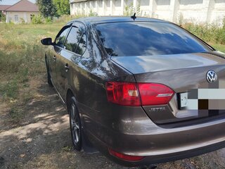 2012 Volkswagen Jetta VI, коричневый, 850000 рублей, вид 3
