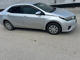 2013 Toyota Corolla XI (E160, E170, E180), серебристый, 900000 рублей, вид 5