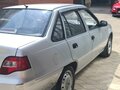 2010 Daewoo Nexia I Рестайлинг, серебристый, 350000 рублей - вид 3