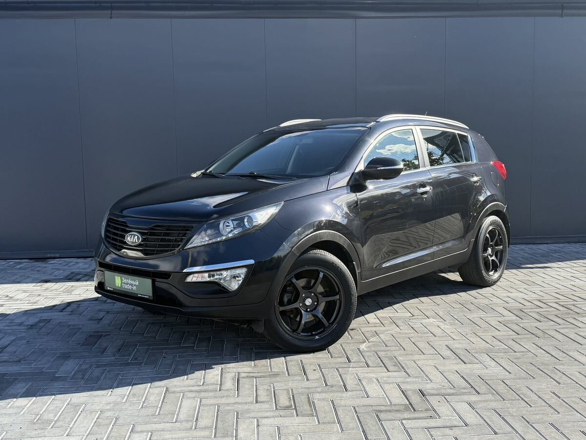 Открыть фотографии: Kia Sportage III