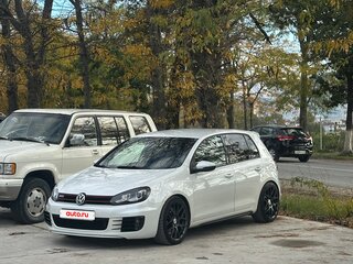 2011 Volkswagen Golf GTI VI, белый, 1700000 рублей, вид 1
