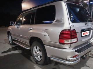 2002 Toyota Land Cruiser 100 Series Рестайлинг 1, серебристый, 1800000 рублей, вид 4