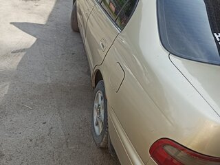 1993 Toyota Corona IX (T190), золотистый, 230000 рублей, вид 4