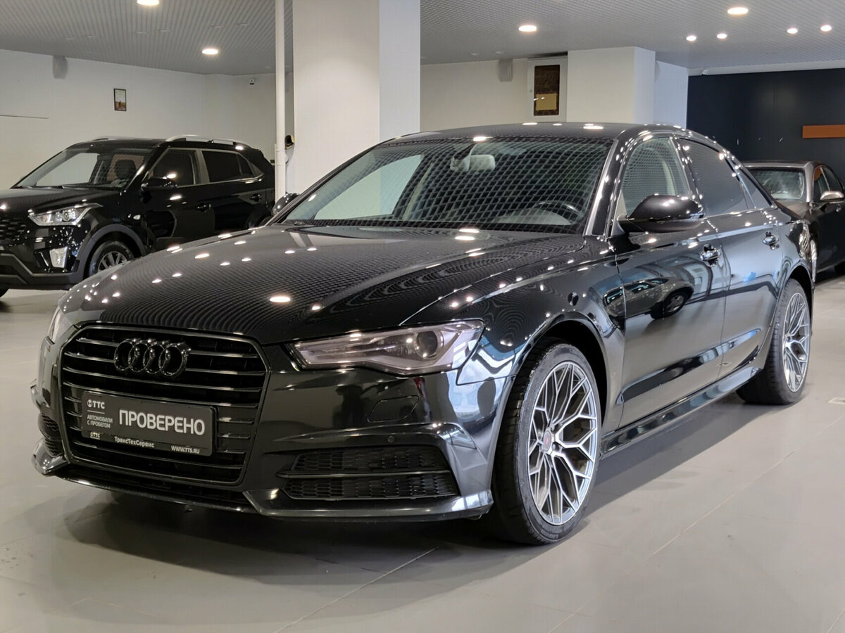 Открыть фотографии: Audi A6 IV (C7) Рестайлинг