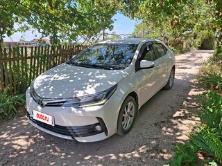 2016 Toyota Corolla XI (E160, E170, E180) Рестайлинг 1, белый, 1570000 рублей, вид 2