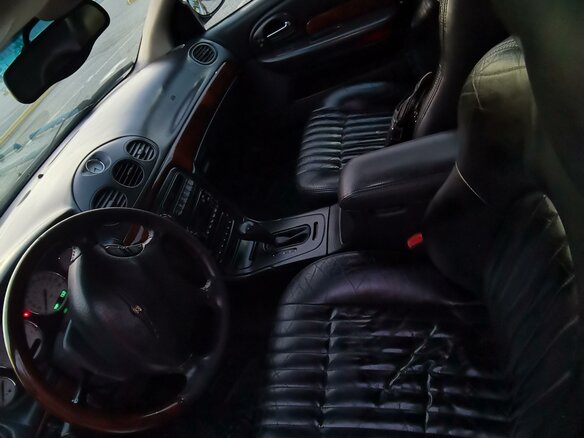2002 Chrysler 300M, чёрный - вид 6