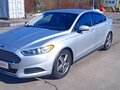 2014 Ford Fusion (North America) II, серебристый, 1090000 рублей - вид 1