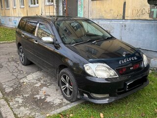 2001 Toyota Corolla Fielder IX (E120, E130), чёрный, 680000 рублей, вид 1