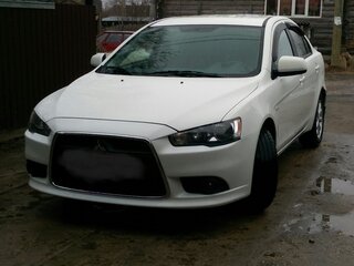 2011 Mitsubishi Lancer X Рестайлинг, белый, 1515000 рублей, вид 2